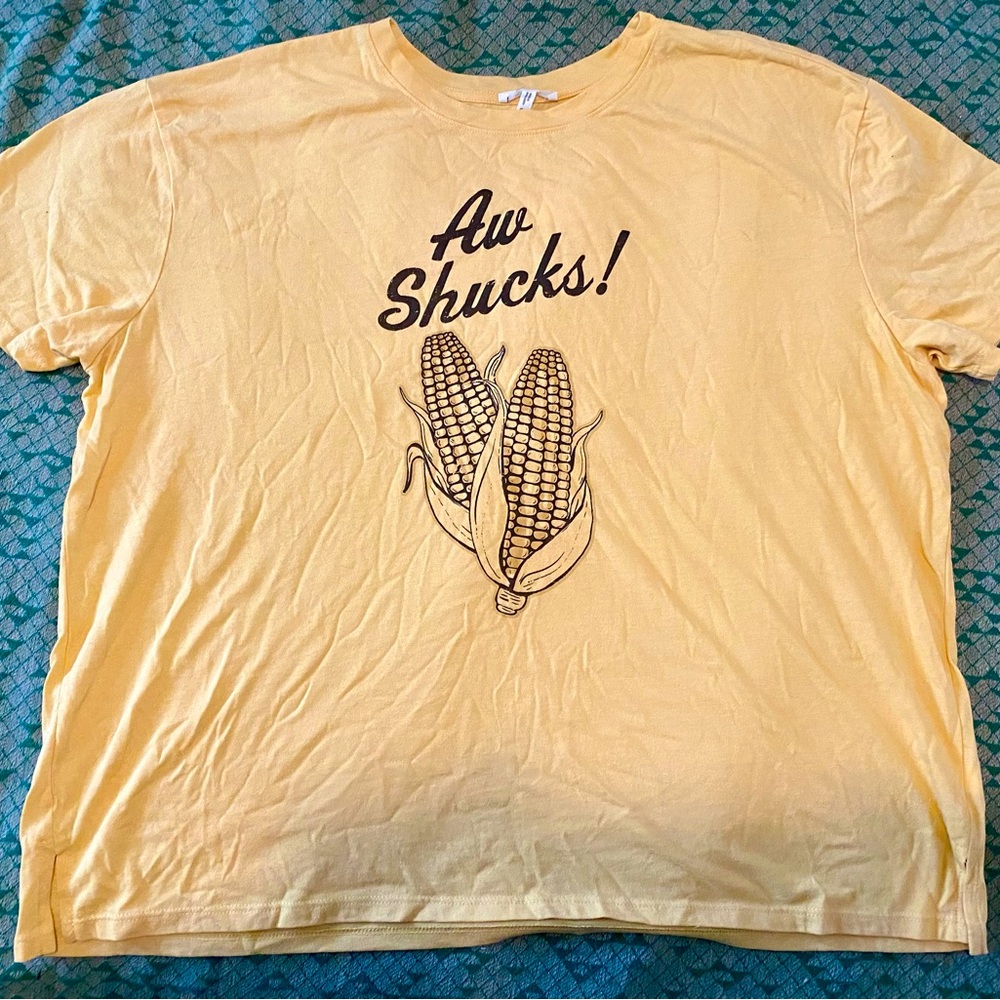 Maurice’s super soft yellow t-shirt, “Aw Shucks” with corn on the cob design. 0x